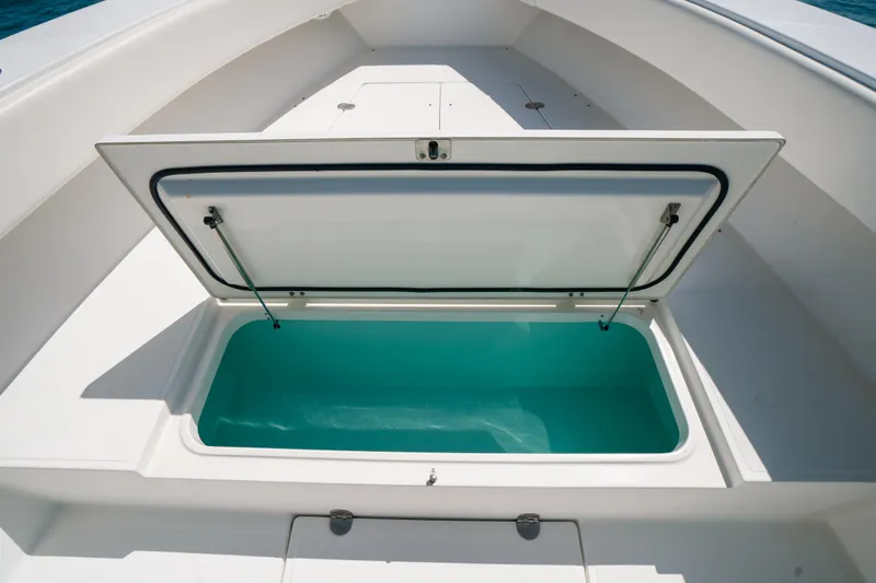 Slide: The Image of Open storage compartment on 2006 Venture 39 Open boat, showcasing spacious interior. - 36
