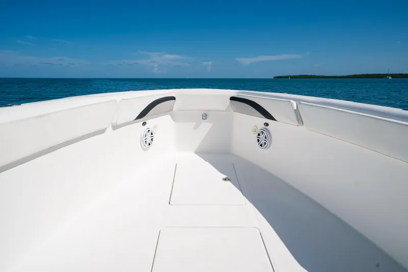 Slide: The Image of Bow view of 2013 Deep Impact 33 boat on open sea under clear blue sky. - 10
