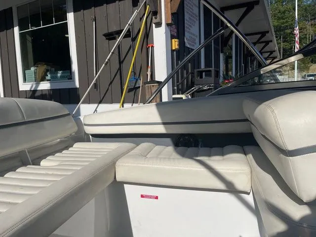 Slide: The Image of 2016 Cobalt R3 boat interior with white leather seating and modern design. - 15