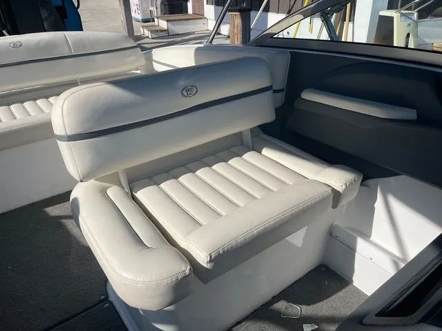 Slide: The Image of 2016 Cobalt R3 boat interior with white leather seating and modern design. - 17