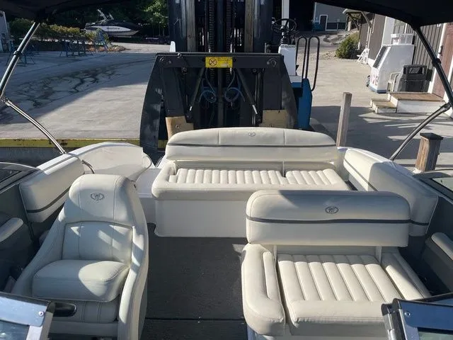 Slide: The Image of 2016 Cobalt R3 boat interior with white leather seating and open deck layout. - 18