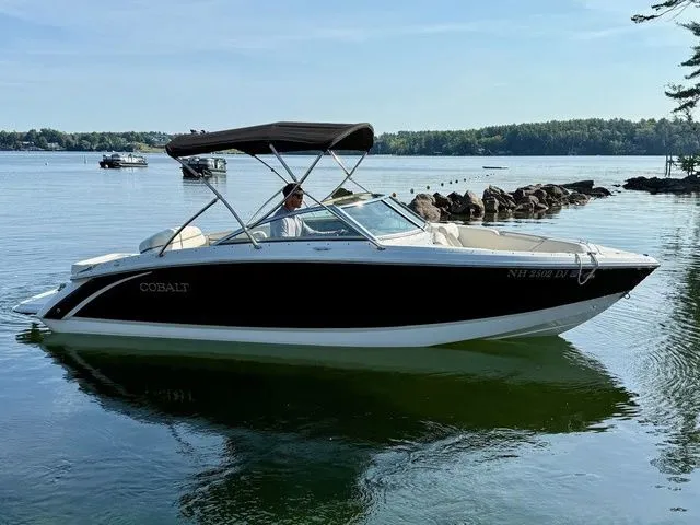 Slide: The Image of 2016 Cobalt R3 boat on a calm lake with scenic background. - 6
