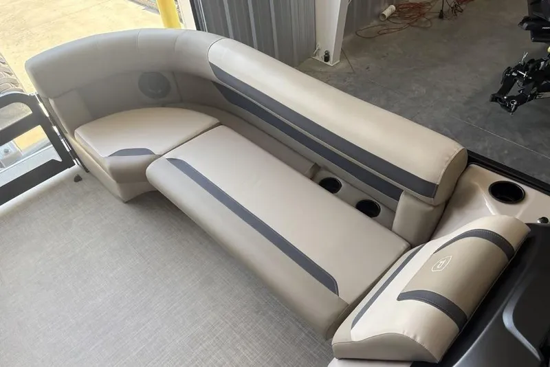 Slide: The Image of 2026 Premier 220 Sunscape RF boat interior with beige and gray seating. - 8