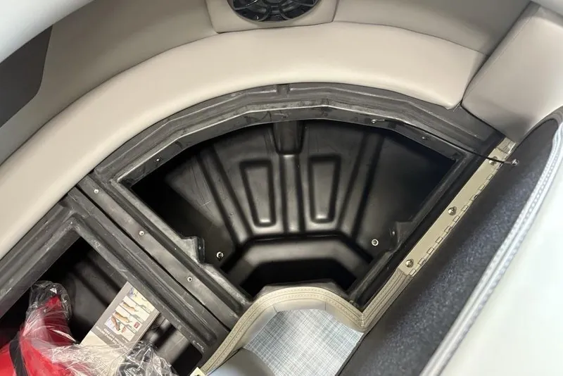 Slide: The Image of Storage compartment in 2026 Premier 220 Sunscape RF XLC boat, featuring spacious interior design. - 14