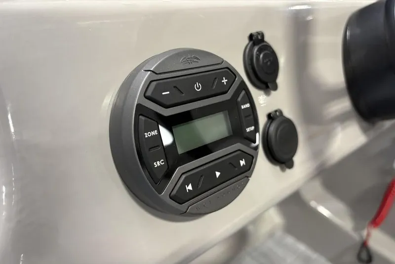 Slide: The Image of Control panel of 2026 Premier 220 Sunscape RF XLC boat, featuring audio system interface. - 19