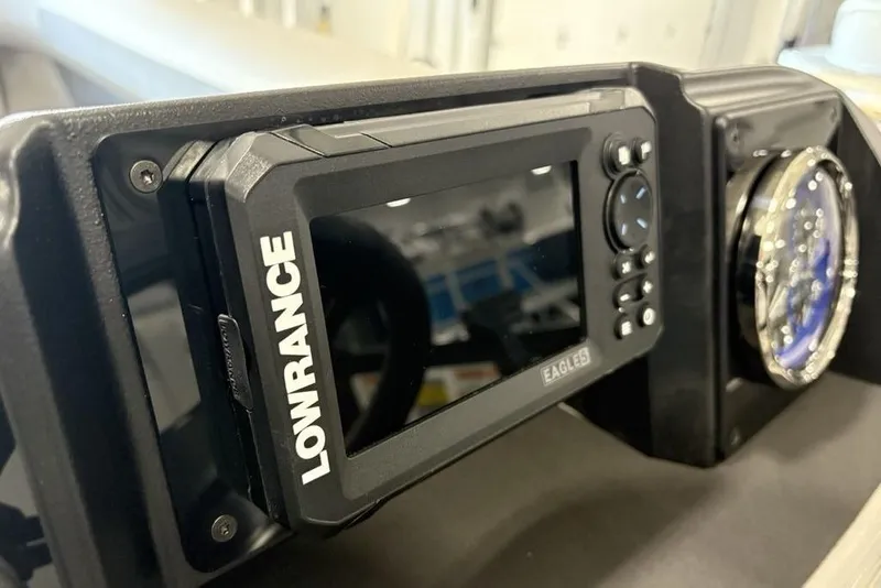 Slide: The Image of Lowrance display on 2026 Premier 220 Sunscape RF XLC boat dashboard. - 23