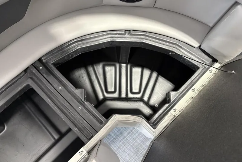 Slide: The Image of Storage compartment of 2026 Premier 220 Sunscape RF XLC boat, featuring sleek interior design. - 26