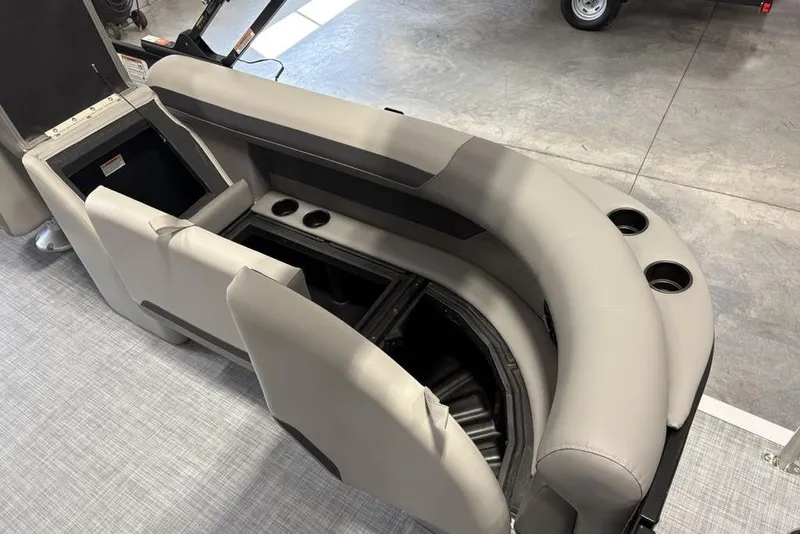 Slide: The Image of Premier 220 Sunscape RF XLC 2026 boat seating with storage and cup holders. - 30