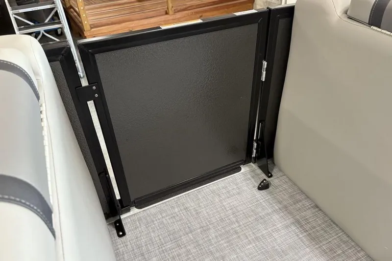 Slide: The Image of Interior view of 2026 Premier 220 Sunscape RF XLC boat, featuring a sleek black gate. - 9