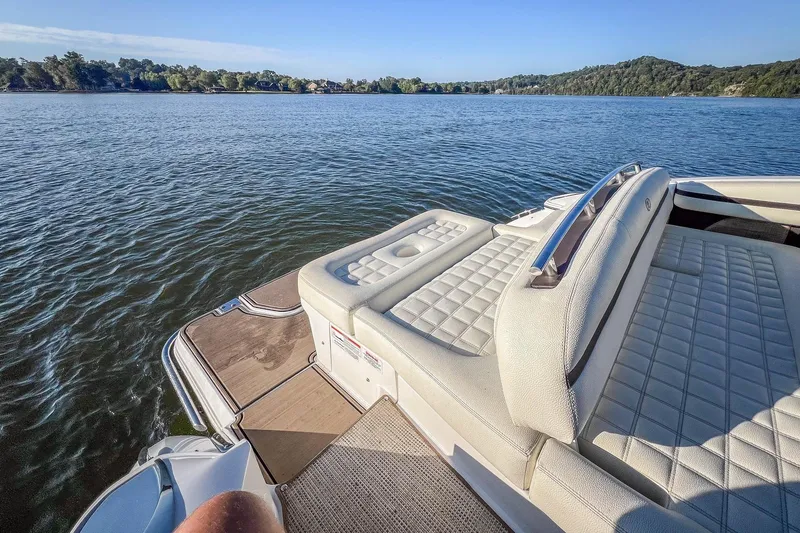 Slide: The Image of 2018 Cobalt R5 boat with luxurious seating on a serene lake. - 20