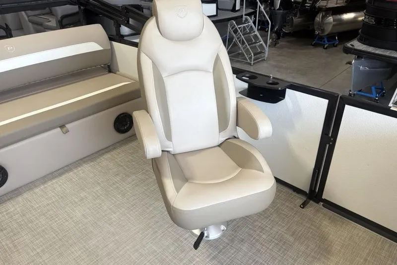 Slide: The Image of Steering console of 2026 Premier 220 SUNSCAPE RL with gauges and controls. - 13