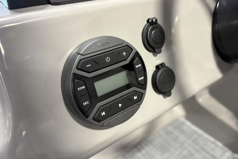 Slide: The Image of Control panel of 2026 Premier 220 SUNSCAPE RL boat with digital display and buttons. - 15