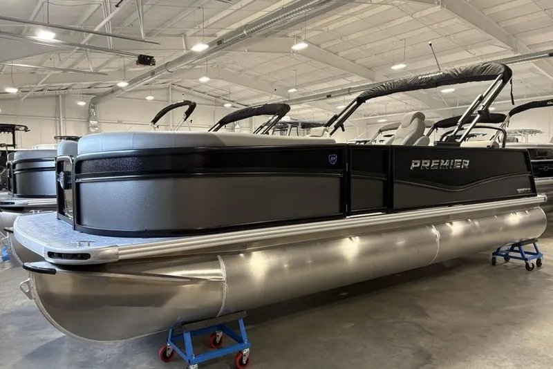 Slide: The Image of 2026 Premier 220 SUNSCAPE RL pontoon boat in showroom, sleek design, modern features. - 3