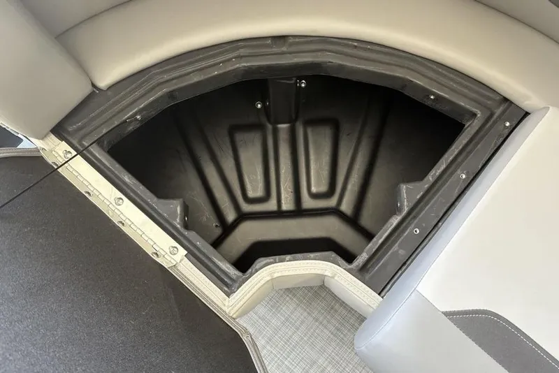 Slide: The Image of Storage compartment in 2026 Premier 220 SUNSCAPE RL boat, featuring durable interior design. - 12