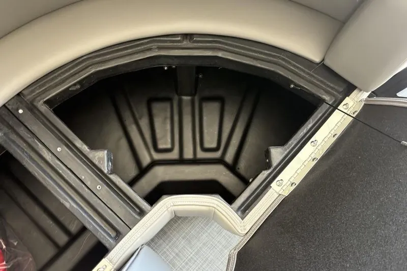 Slide: The Image of Storage compartment in 2026 Premier 220 SUNSCAPE RL boat, featuring durable construction. - 9