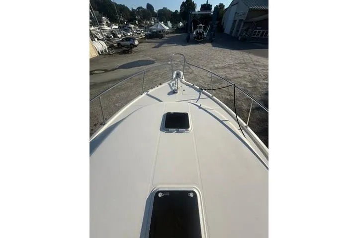 Slide: The Image of 2010 Pursuit OS 375 Offshore boat deck view at marina. - 17