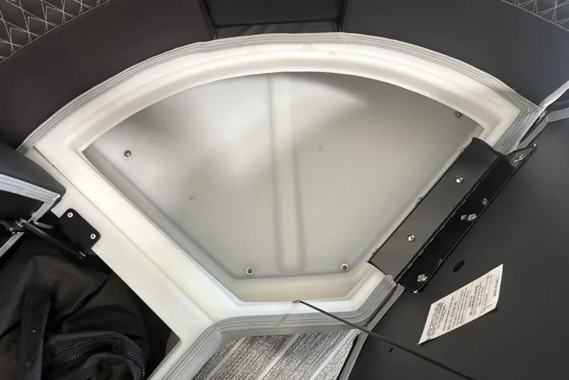 Slide: The Image of Interior detail of 2026 Premier 250 Solaris RS CL boat, showcasing storage compartment. - 12