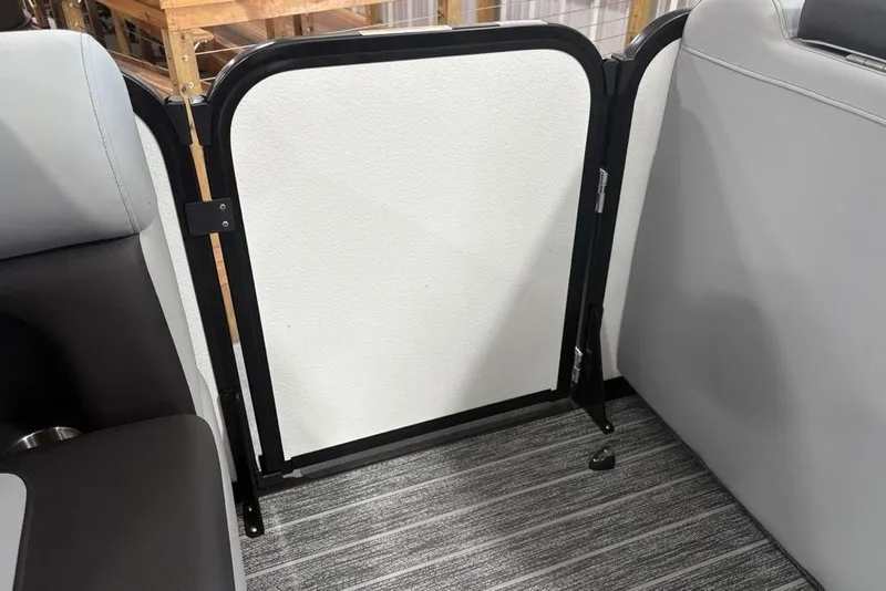 Slide: The Image of Interior view of 2026 Premier 250 Solaris RS CL boat with seating and safety gate. - 15