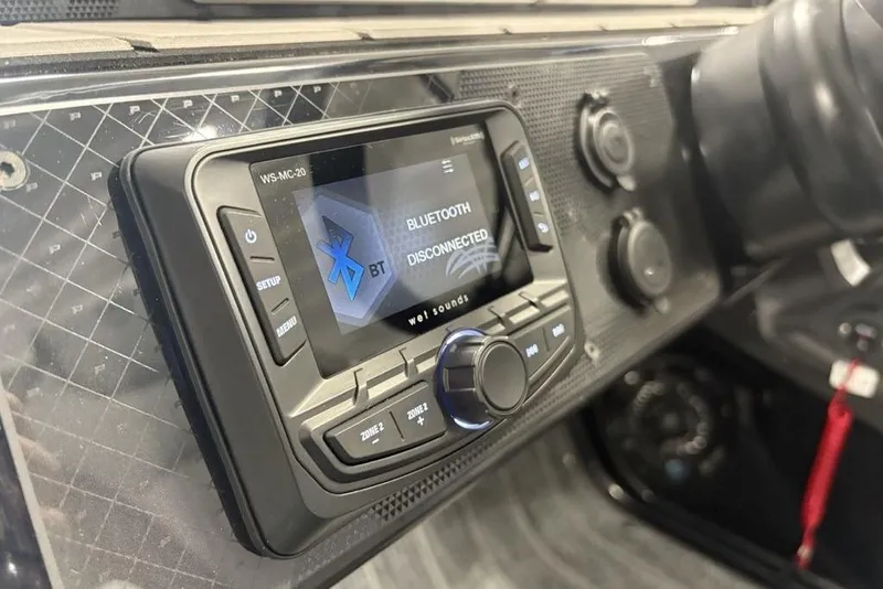 Slide: The Image of Dashboard of 2026 Premier 250 Solaris RS CL with Bluetooth stereo system. - 16