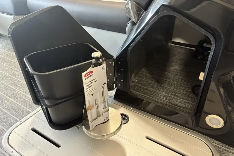 Slide: The Image of Interior of 2026 Premier 250 Solaris RS CL with storage compartment and OXO paper towel holder. - 20