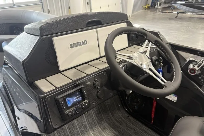 Slide: The Image of Steering console of 2026 Premier 250 Solaris RS CL with Simrad display and modern controls. - 22