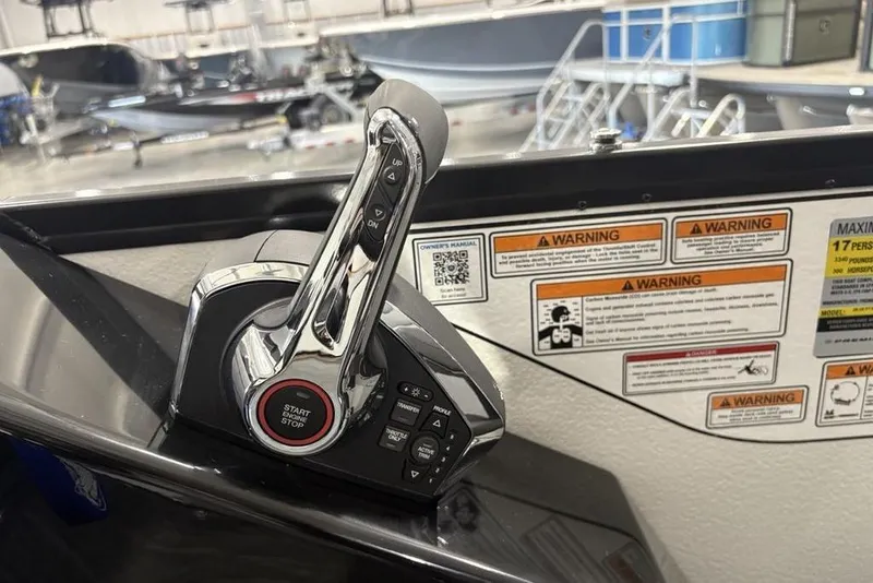 Slide: The Image of Control panel of 2026 Premier 250 Solaris RS CL boat with warning labels. - 23