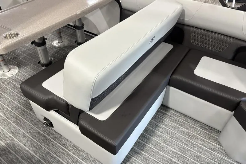 Slide: The Image of Premier 250 Solaris RS CL 2026 boat interior with luxurious seating and table. - 26