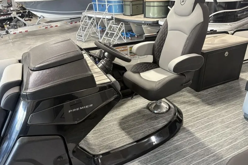 Slide: The Image of Captain's chair on 2026 Premier 250 Solaris RS CL boat, featuring sleek design and modern controls. - 31