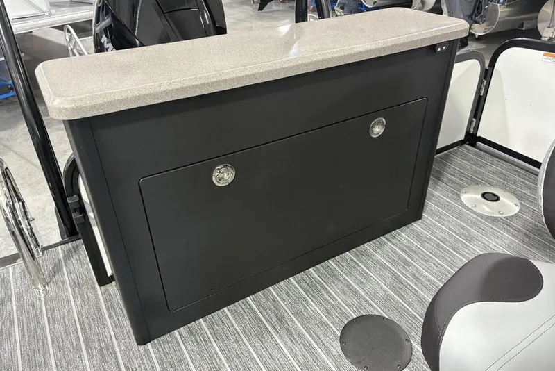 Slide: The Image of Premier 250 Solaris RS CL 2026 boat interior with sleek storage compartment and modern design. - 40