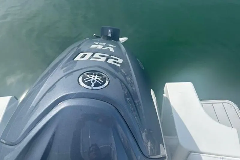 Slide: The Image of 2025 Parker 2400 Center Console with Yamaha 250 V6 outboard engine on water. - 14