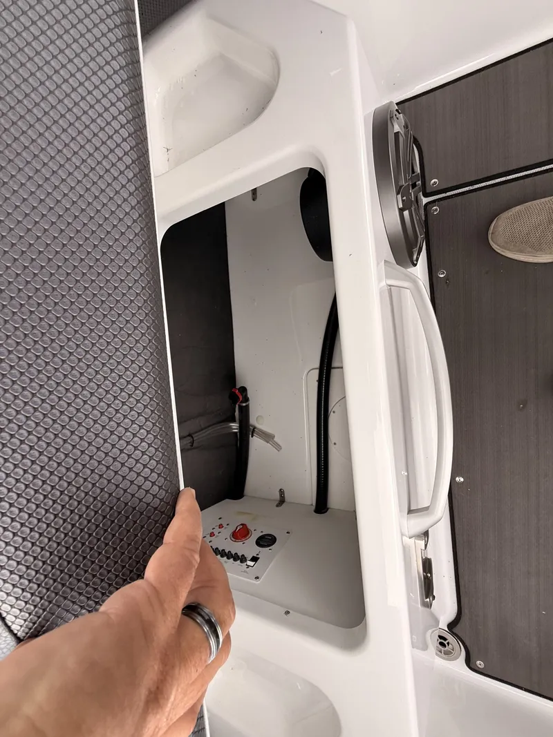 Slide: The Image of Interior of 2024 Scarab 285 Wake ID with storage compartment. - 29