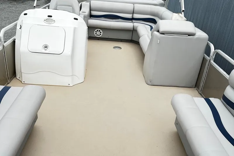 Slide: The Image of 2007 Godfrey Sweetwater Tuscany pontoon boat interior with gray seating and spacious layout. - 6