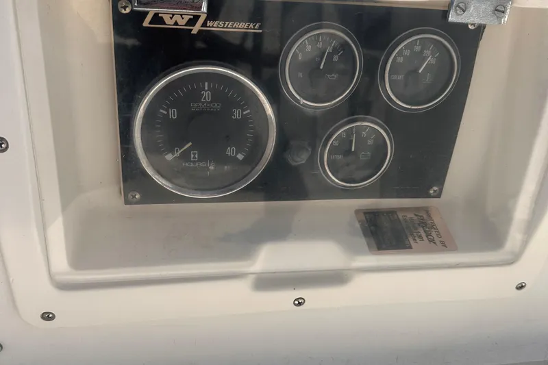 Slide: The Image of Control panel of a 1978 Pearson 424 sailboat with Westerbeke gauges. - 17