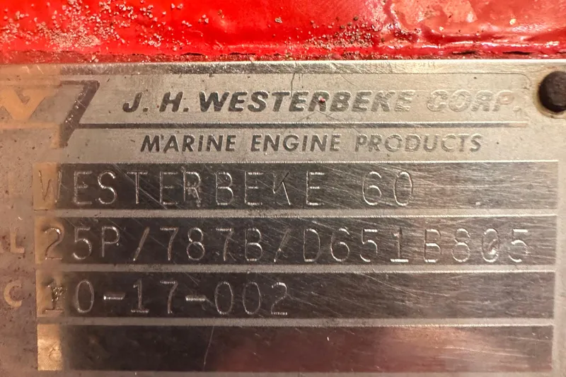 Slide: The Image of Metal plate with "J.H. Westerbeke Corp" and engine details, Pearson 424, 1978 model. - 20