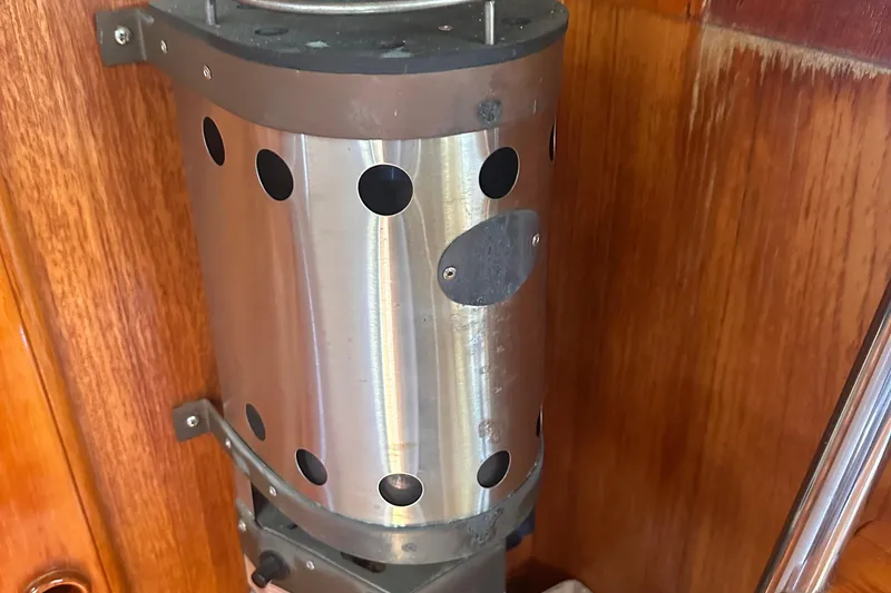 Slide: The Image of Stainless steel heater on 1978 Pearson 424 yacht, mounted on wooden panel. - 25