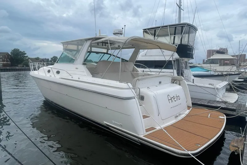 The Image of 1995 Tiara Yachts 4000 Express dockside - 0