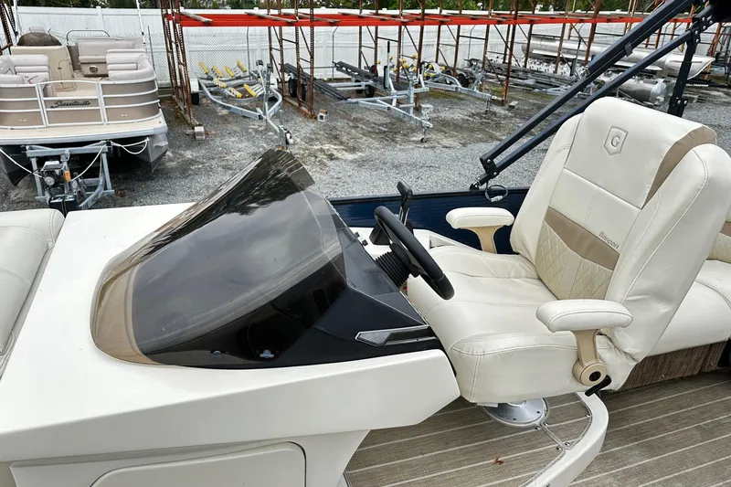 Slide: The Image of 2018 Godfrey San Pan Tri Toon boat seat with cup holders and elegant design. - 5