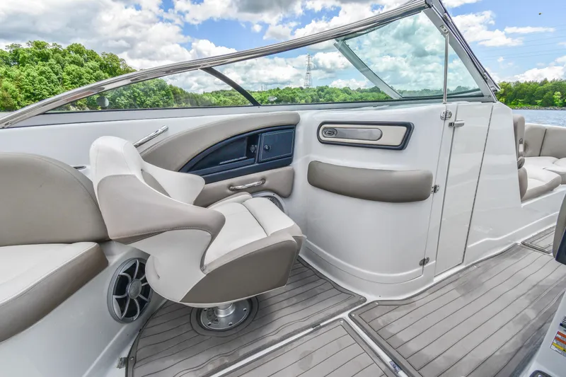Slide: The Image of 2019 Crownline Eclipse E255 SURF boat interior with sleek seating and modern design. - 18
