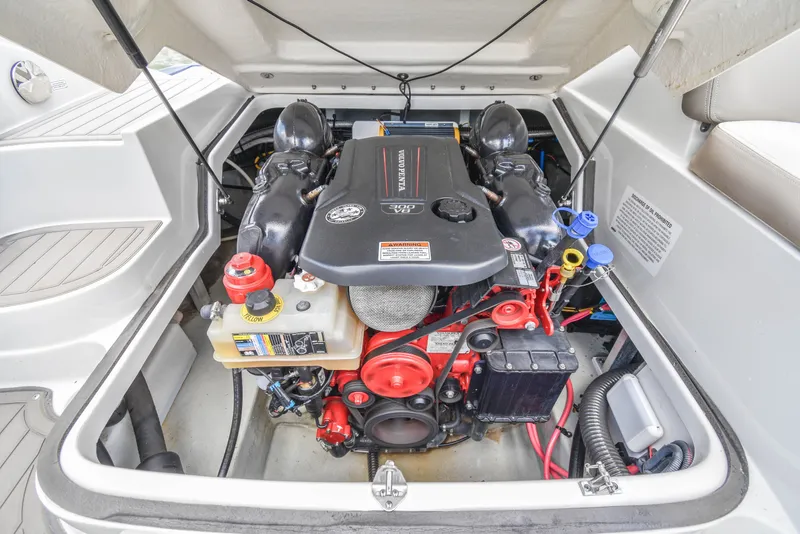 Slide: The Image of 2019 Crownline Eclipse E255 SURF boat engine compartment, showcasing detailed mechanical components. - 26