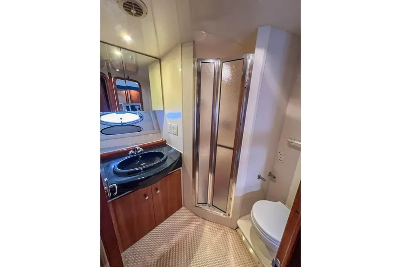 Slide: The Image of Luxurious bathroom in 2002 Carver 350 Mariner yacht with shower, sink, and toilet. - 20