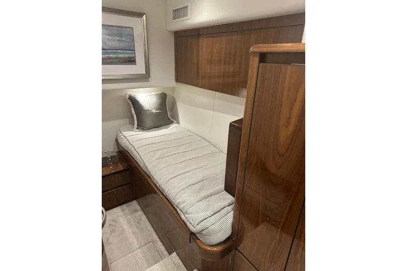 Slide: The Image of Luxurious cabin interior of 2017 Viking 55 Convertible yacht with elegant wood finish. - 107