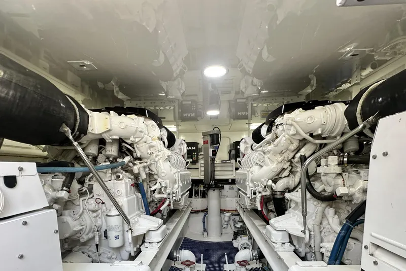 Slide: The Image of Engine room of 2017 Viking 55 Convertible yacht, featuring dual powerful engines. - 129