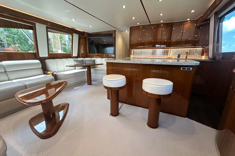 Slide: The Image of Luxurious interior of 2017 Viking 55 Convertible yacht with elegant seating and modern design. - 66
