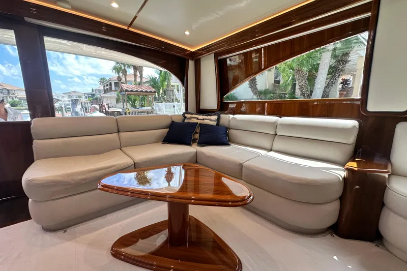 Slide: The Image of Luxurious interior of 2017 Viking 55 Convertible yacht with plush seating and elegant wood finishes. - 69