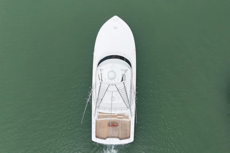 Slide: The Image of Aerial view of 2017 Viking 55 Convertible yacht on calm water. - 7