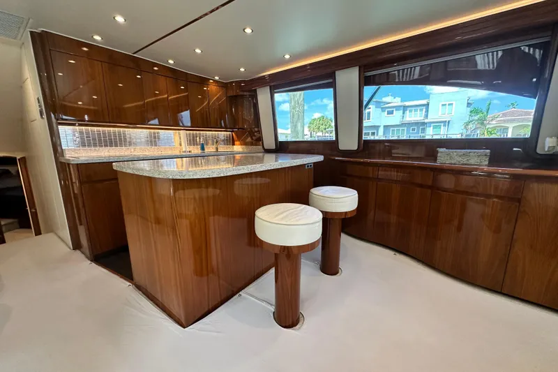 Slide: The Image of Luxurious interior of 2017 Viking 55 Convertible yacht with polished wood and modern design. - 70