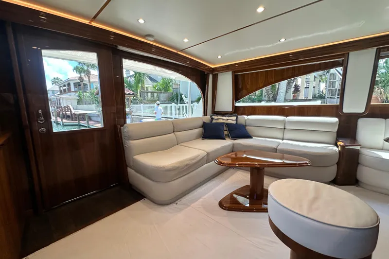 Slide: The Image of Luxurious interior of 2017 Viking 55 Convertible yacht with plush seating and elegant wood finishes. - 81