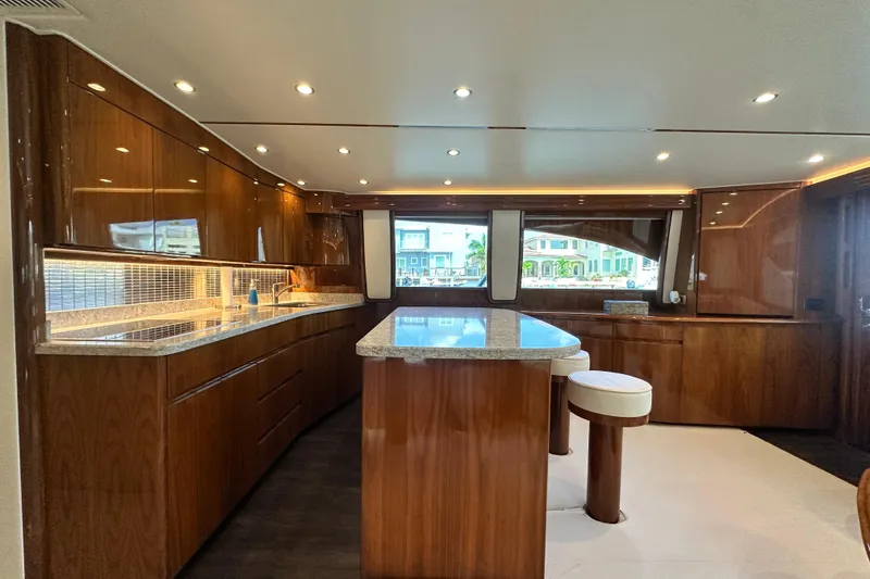 Slide: The Image of Luxurious interior of 2017 Viking 55 Convertible yacht with elegant wood finishes. - 84