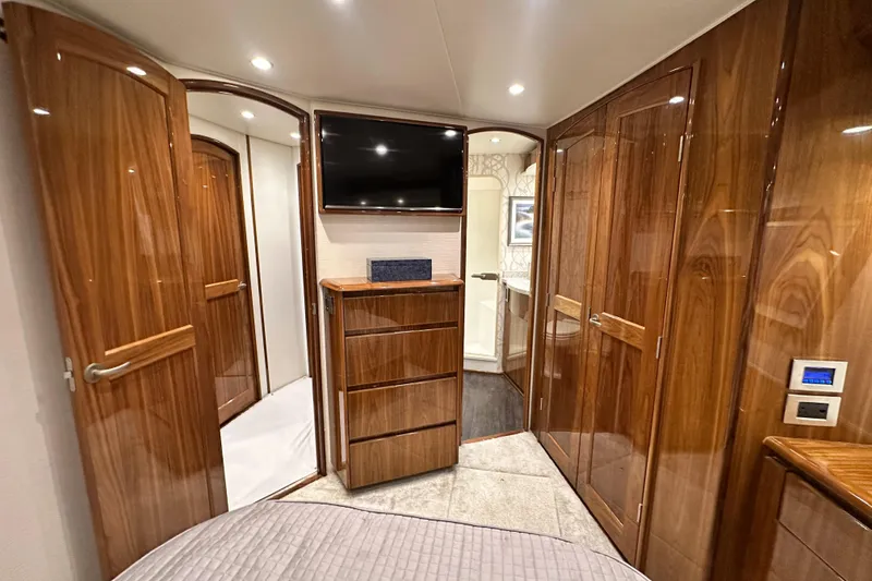 Slide: The Image of Luxurious interior of 2017 Viking 55 Convertible yacht with wood finishes and modern amenities. - 92