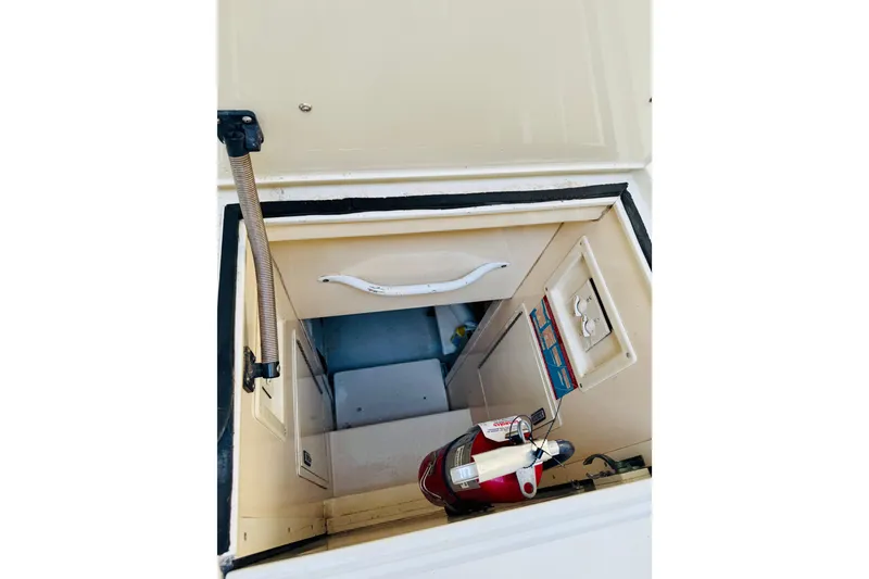 Slide: The Image of Hatch entrance of 1993 Viking 50 Convertible boat with fire extinguisher visible. - 17